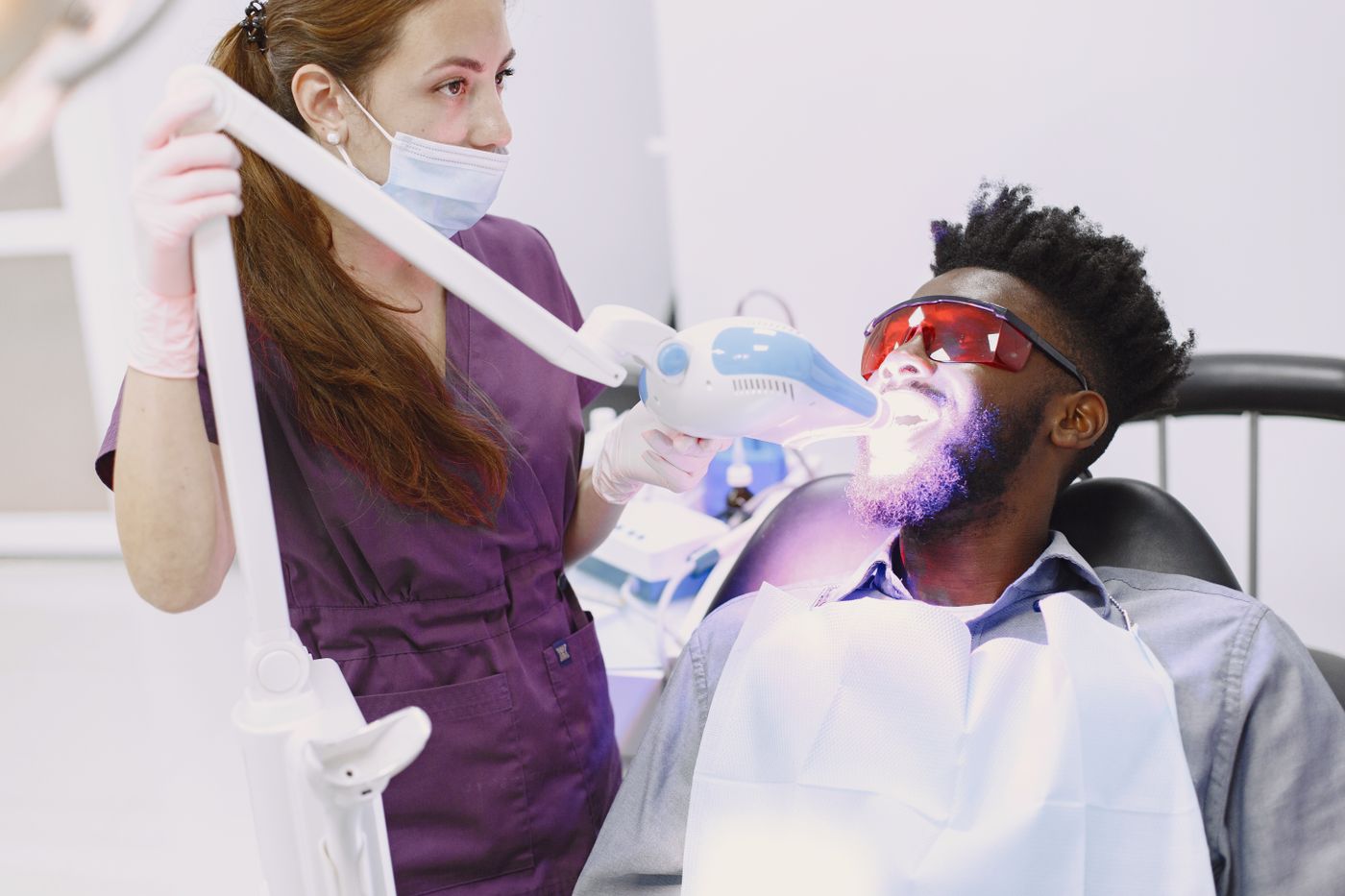 A whitening treatment being carried out in a dental surgery
